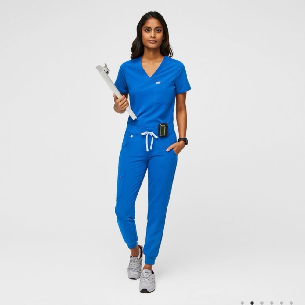 FIGS technical collection. Zamora jogger scrub pants in royal blue.